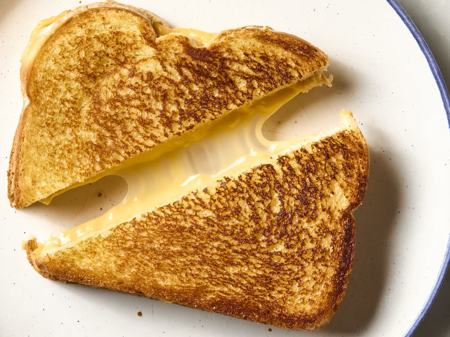 A grilled cheese cut in half